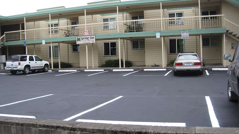 Apartment-Complex---Crack-Repair,-Oil-Spot-Repair,-Sealcoat-and-striping