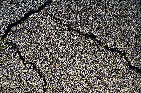 What Could Cause Asphalt To Crack?