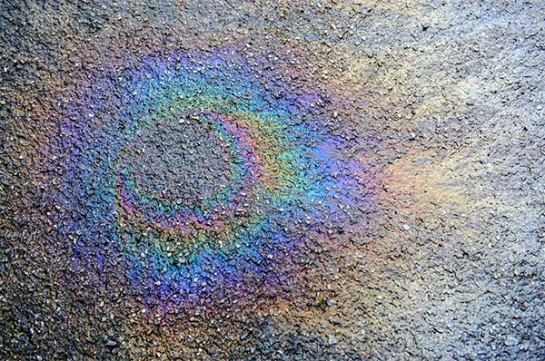 How to treat oil spots in parking lots and driveways ...